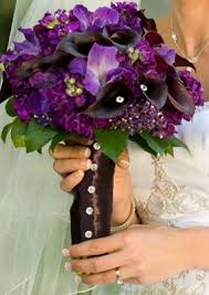 In addition to purple flower names, we'll be sharing a few hints for how to get the most of your purple wedding flowers, their seasonal availability and flower pairing suggestions. Purple Flowers Weddings Wedding Forums Weddingwire Dark Purple Mini Calla Lilies Thricillium Sto Purple Bouquets Purple Wedding Flowers Purple Flowers