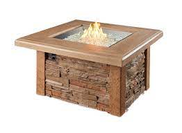 The fire pit base includes an access door ideal for housing a 20 lb propane tank (sold separately) as well as a 24 square stainless steel crystal fire gas burner to provide optimal flame height and warmth. Sierra Square Gas Fire Pit Table Cloister Cabinetry