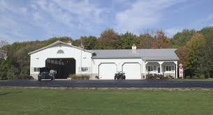 This Garage Was Built For Rick Of Grand Ledge Mi Special Features Morton S Hi Rib Steel Porch Cupolas Morton Building Pole Barn House Plans Barn House Plans