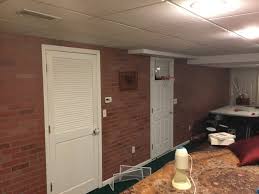 The seepage will then trickle down the wall and into the drain tile. Faux Brick Panels Added To Basement Monk S Home Improvements In Nj