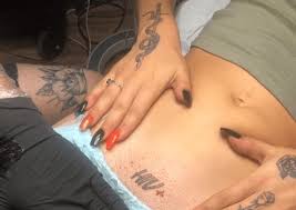 Music tattoo designs music tattoos tattoo designs for women body art tattoos tribal tattoos tatoos note tattoo tattoo you angel quote tattoo. Photos Lady Tattoos Hiv On Her Privates To Announce She S Hiv Positive Ghanacelebrities Com