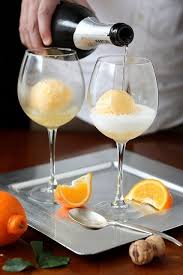 7 Simple Champagne Cocktails To Help You Ring In The New Year In Style Champagne Sorbet Champagne Float Alcoholic Drinks