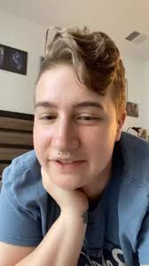 ID: Video of Ace chilling in their bedroom with one hand under their chin.  They’re swoop is epically swoopy, and their eyes are bright and joyful.  Full transcript in caption.⁣, ⁣, Happy Saturday epic ...