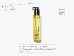 This lightweight hair oil has camelia for shine, hydration, and frizz control. Shu Uemura Art Of Hair Essence Absolue Nourishing Violet Grey