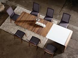 Such a table will accommodate a small family but it can also be used by more people when need be. Expandable Dining Tables The Secret To Making Guests Feel Welcome