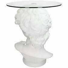 Use the light but solid table as a side table in the living room, a nightstand in the bedroom or as a sculptural table in the hallway. David Bust White Side Table Audenza