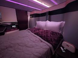 Passengers flourish in premium first class seats. Qatar Airways Unveils Double Beds On Flights The Independent The Independent