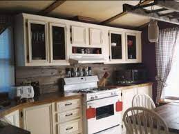 These include a frame around a central panel. 7 Affordable Ideas To Update Mobile Home Kitchen Cabinets Mobile Home Living