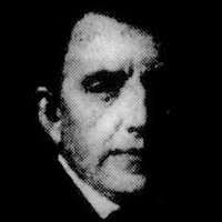 John Pierpont Morgan, Jr., full-length portrait, standing, facing left,  holding U.S. flag]