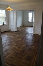 1 Coat Of Minwax Dark Walnut Stain On Sanded 90 Year Old Red Oak Parquet Floors 3 Year Update Doing A Buff A Flooring Wood Parquet Flooring Parkay Flooring