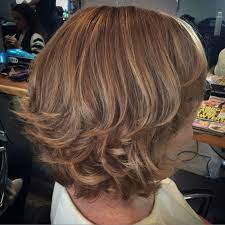 Warm Browns Caramels And Honey Blondes To Enhance This Cute Flicky Bob Honey Blonde Brunette Beauty