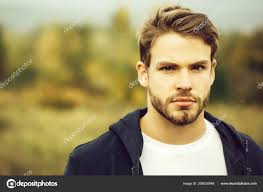 Young bearded sexy guy — Stock Photo © Tverdohlib.com #206830948