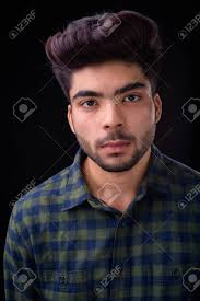 Indian man with a beard of steel. Young Handsome Indian Man Against Black Background Stock Photo Picture And Royalty Free Image Image 142547576