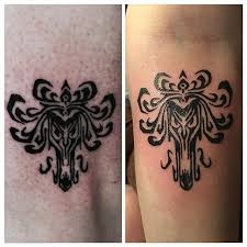 Check spelling or type a new query. Did These Matching Family Tattoos Today It S The Design On The Wallpaper In The Hauntedmansion I Haunted Mansion Wallpaper Haunted Mansion Tattoo Tattoos