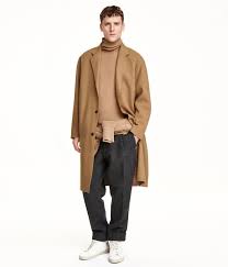 Coat in a felted wool blend with narrow notch lapels, a decorative buttonhole and buttons down the front. H M Wool Blend Coat Camel 149 H M Lookastic