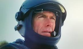 Clint Eastwood as Mitchell Gant taking a moment to refuel in Firefox (1982).