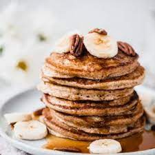 Healthy Banana Oatmeal Pancakes Made Right In The Blender Ambitious Kitchen Recipe Banana Oatmeal Pancakes Oatmeal Pancakes Healthy Pancake Recipes