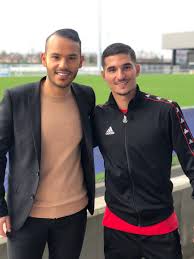 Mohamed bouhafsi et sa compagne au photocall de la 28ème cérémonie des trophées unfp (union nationale des footballeurs professionnels) au . Bouhafsi