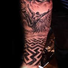 Beautiful black & white half sleeve warrior tattoo. Top 30 Icarus Tattoos For Men