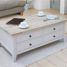 Shown in quarter sawn white oak with a michael's cherry stain. Hugo Isaac Paige Rectangular Large 4 Drawer Coffee Table Distressed Grey Limed Oak Leader Furniture
