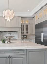 Mountain white danby marble countertops contrast: Cream Gray Cabinets With Marble Countertops Tile Backsplash Stainless Gray Appliances Glass Grey Kitchen Colors Cream Kitchen Cabinets Grey Cabinets