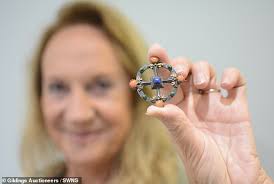 Woman discovers silver brooch she bought for less than £20 at a market in  the 1980s is a rare Victorian treasure worth £15,000 after spotting a  similar piece of jewellery