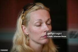 Singer Amanda Mace, playing the part of Eva, performs