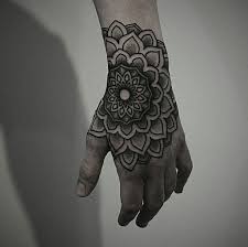 Black Dot Work Mandala Tattoo On The Left Hand Hand Tattoos For Guys Hand Tattoos Mandala Hand Tattoos