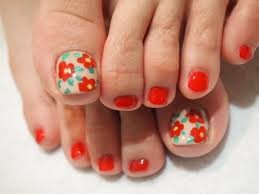 Whether done freehand with a brush or with the help of stamps, a floral effect is surprisingly easy — and always lovely. Crafty Pedicure Nail Art Designs