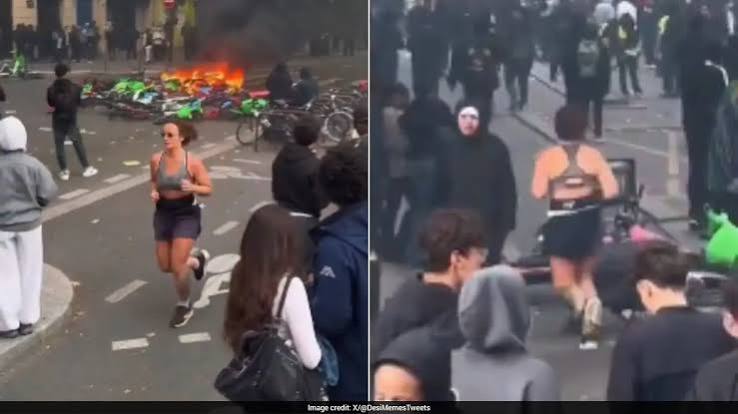 Dystopian Fitness Video": Video Of Woman Jogging Amid France Protests Goes Viral Online
