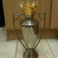 The premier league trophy is the ultimate prize that teams battle for over 38 matches. Replica Premier League Trophy 246139609