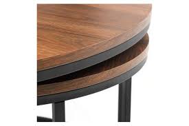 Two small end tables conveniently slide under the large, round coffee table when needed, perfect for compact spaces. Julian Bowen Bellini Walnut And Metal Round Nesting Coffee Table Furnitureinstore