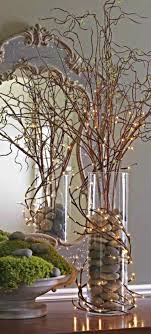 Twigs Lights And Rocks Arrangement Christmas Centerpieces Christmas Deco Fall Decor