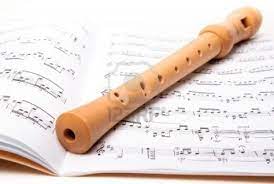 Wooden Flute On Sheet Music Close Up Wooden Flute Sheet Music Flute