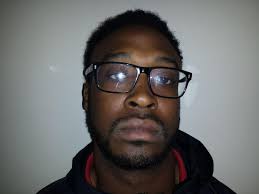 Man arrested in stabbing of football player