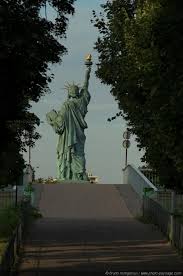 A copy of the statue of liberty greets visitors to the birthplace of auguste bartholdi. La Replique De La Statue De La Liberte Allee Des Cygnes Paris France Statue De La Liberte Statue Pont Paris