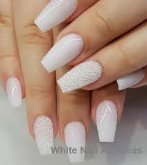 A really simple design that looks so gorgeous is a plain and simple white coat, with an added matte finish. 30 Simple Trending White Nail Design Ideas 3 Nailartideas Naildesign White Acrylic Nails Prom Nails Coffin Nails Designs