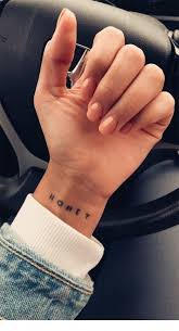 Have an inspirational word tattooed on your wrist and you can refer to it all day long. Word Wrist Tattoo Fonts Wordwristtattoofonts Tattoos Tiny Tattoos Inspirational Tattoos