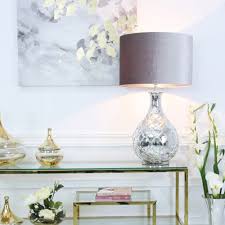 Many great designs you can browse in the internet to look at like; Silver Mercury Glass Table Lamp With Grey Velvet Shade Table Lamps