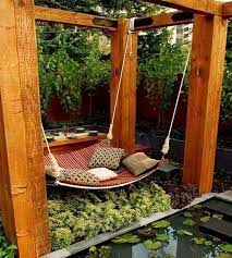 31 Diy Ways To Make Your Backyard Awesome This Summer Backyard Backyard Hammock Budget Backyard
