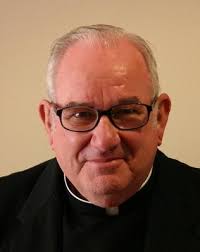 Msgr. Raymond Mullins Obituary