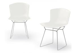 The seat pad is in a variety of upholsteries. Bertoia Plastic Knoll Set Of 2 Side Chairs Milia Shop