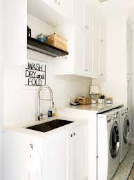 The current design trend is to make your home's style feel as seamless as possible from room to room, so by redesigning your kitchen and laundry at the same time, you're able to use the same cabinet door profile in each space, as well as other materials such as matching benchtops and shelving. Laundry Room Remodel Reveal