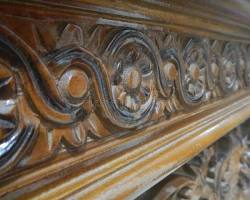 jepara wood carving on teak wood handcrafted close up, buatan AI
