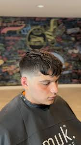 Skin fade with textured top 🔥 Styled with @mukhaircare_usa @john.cerulli  #faded #fadedworld #mensfashion #menshair #menshaircut #barbergang  #behindthechair #menshairstyle #style #fashion #nationalfadeleague  #nationalbarbersassociation #thebarberpost ...