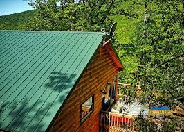 Lakeside cabins on with great views, fishing beach, and water trampoline. Yellow Rose Realty Bryson City Cabin Rentals