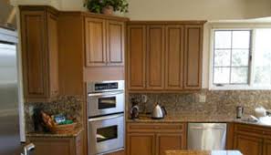 Painted oak cabinets tend to look like, well, painted oak cabinets. Home Home Improvements Of Colorado