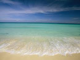Clear Blue Water And Wispy Clouds Along The Beach At Cancun Photographic Print By Michael Melford Allposter Beach Landscape Waves On The Beach Cancun Beaches