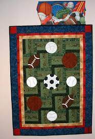 Maybe i can recreate and use cotton! 33 Football Quilt Ideas Football Quilt Football Sports Quilts