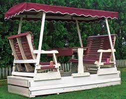 Wood porch swings with rope chain, wooden gliders. Garden Swings And Gliders